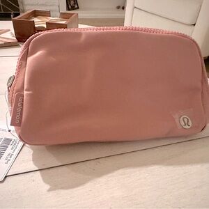 Lululemon rose pink belt bag. Brand new with tags